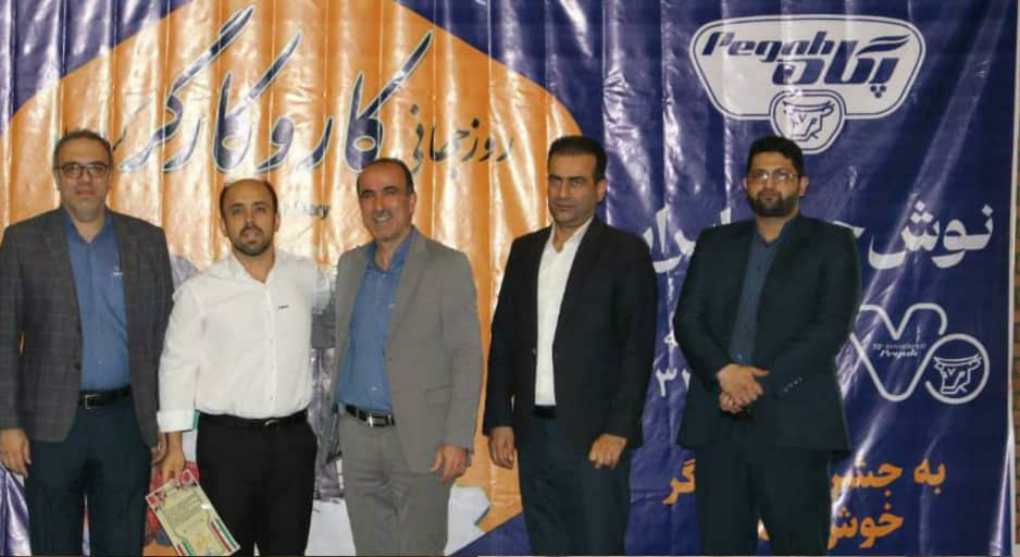 تجلیل از کارگران و گرامیداشت یاد جانباختگان حادثه بندرعباس در شرکت پگاه گیلان